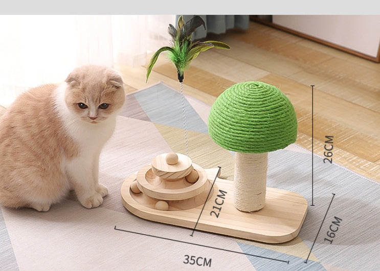 Cat playing with a green and wooden cat toy on a wooden floor.